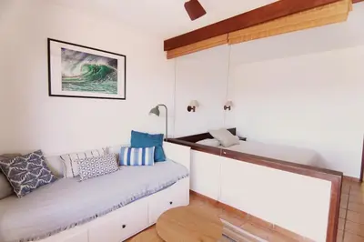Cama o camas de una habitación en San Agustín Beach Apartment