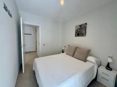 Cama o camas de una habitación en Beach & City Apartment