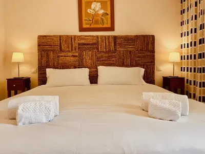 Cama o camas de una habitación en Apartamentos las Rocas 9