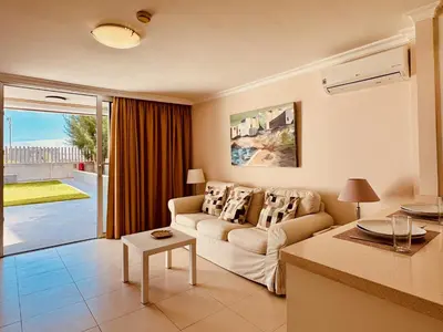 Zona de estar de Apartamentos las Rocas 9