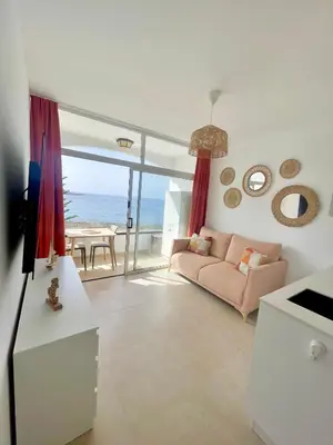 Una televisión o centro de entretenimiento en Luxury Apartment Playa del Cura