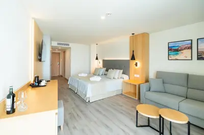 Cama o camas de una habitación en HL Rondo Hotel