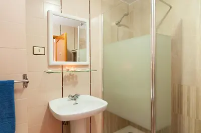 Un baño de Apartamentos Kasa