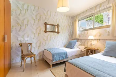 Cama o camas de una habitación en Elysium by VillaGranCanaria