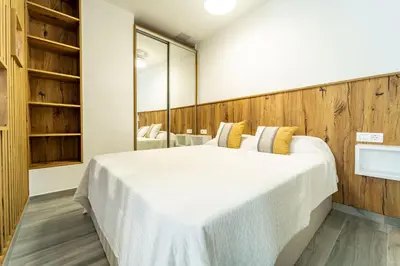 Cama o camas de una habitación en Bello Horizonte Playa de las Canteras