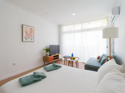 Cama o camas de una habitación en Downtown Studio Canteras