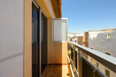 Un balcón o terraza de Coquete Apartment,Near Airport,Balcony,Cozy