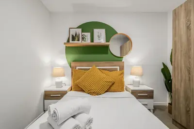 Cama o camas de una habitación en Living Central Stay Verol