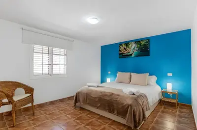 Cama o camas de una habitación en Sardina Beach Retreat
