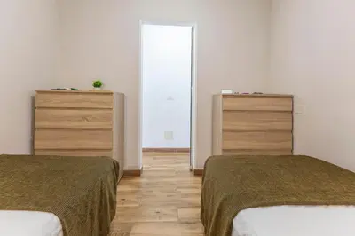 Cama o camas de una habitación en Nectarinas C1 by VillaGranCanaria