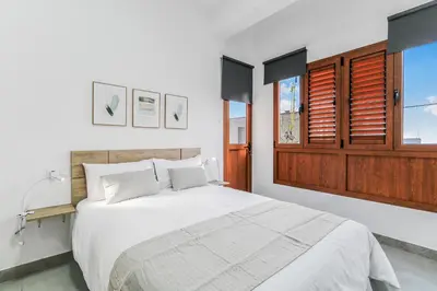 Cama o camas de una habitación en Galdar Modern Suites