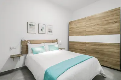 Cama o camas de una habitación en Galdar Modern Suites