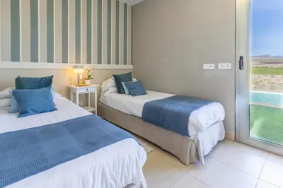 Cama o camas de una habitación en Solara by VillaGranCanaria