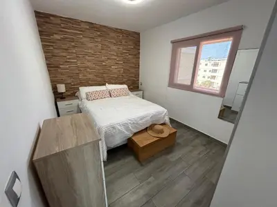 Cama o camas de una habitación en LAS OLAS heated pool