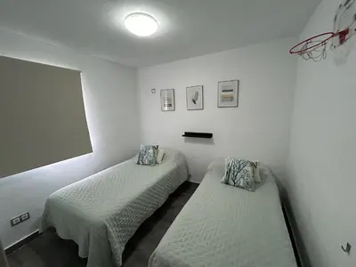Cama o camas de una habitación en LAS OLAS heated pool