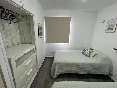 Cama o camas de una habitación en LAS OLAS heated pool