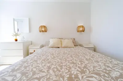 Cama o camas de una habitación en Guanabara Sunset
