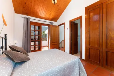 Cama o camas de una habitación en Vivelorural Los Tableros Agaete great terrace
