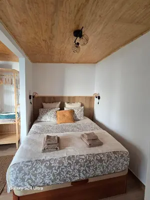 Cama o camas de una habitación en BEACH Arguineguin SEA VIEW 7 CHG FAMILY HOTEL