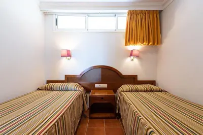 Cama o camas de una habitación en TC Apartamentos Dorotea