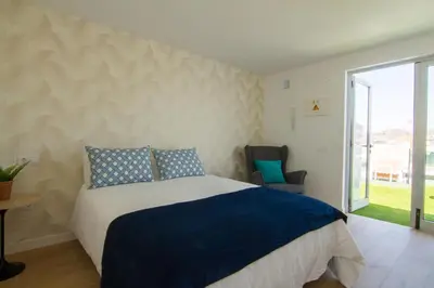Cama o camas de una habitación en Estudio con terraza en Arguineguín LA SAL 4