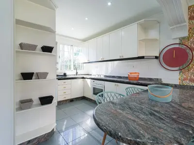 Una cocina o zona de cocina en Timon Beach Suites San Agustin