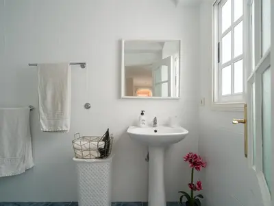 Un baño de Canteras City