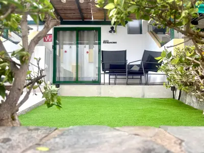 Jardín al aire libre en Vega Maspalomas - Escapada de sol, piscina y relax