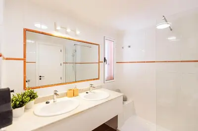 Un baño de Apartamento en Pasito Blanco PTOM11