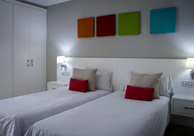 Cama o camas de una habitación en Holiday Club Vista Amadores