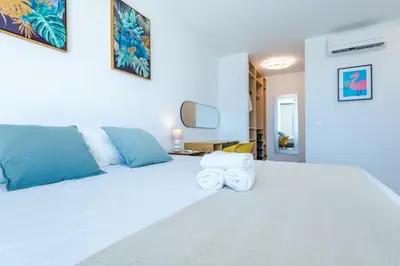 Cama o camas de una habitación en Kaiman 34 by Infinity Summer