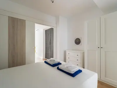 Cama o camas de una habitación en Ferreras Suites Las Canteras