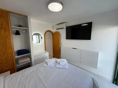 Cama o camas de una habitación en Dunaflor Verde Bungalows