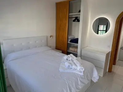 Cama o camas de una habitación en Dunaflor Verde Bungalows