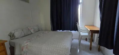 Cama o camas de una habitación en Apt Río Piedra Puerto Rico