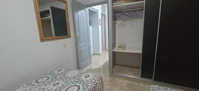 Cama o camas de una habitación en Apt Plaza 1 San Fernando