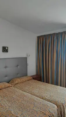 Cama o camas de una habitación en Ataitana Bungalows Maspalomas