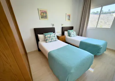 Cama o camas de una habitación en Holiday Club Sol Amadores