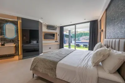 Cama o camas de una habitación en Villa Soleil Anfi Tauro Golf