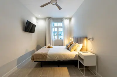 Cama o camas de una habitación en House near the beach with rooftop and BBQ