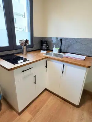 Una cocina o zona de cocina en TABLERO 101, coqueto y moderno estudio