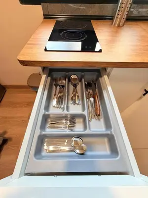 Una cocina o zona de cocina en TABLERO 101, coqueto y moderno estudio