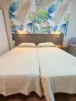 Cama o camas de una habitación en TABLERO 101, coqueto y moderno estudio