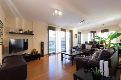 Una televisión o centro de entretenimiento en Edmond Vibes Villa Canarias