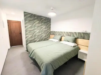 Cama o camas de una habitación en Green Day by Casas Cocodrilo