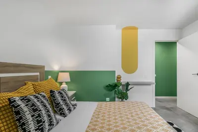 Cama o camas de una habitación en Penthouse City Hub Stay