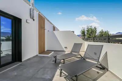 Un balcón o terraza de Penthouse City Hub Stay