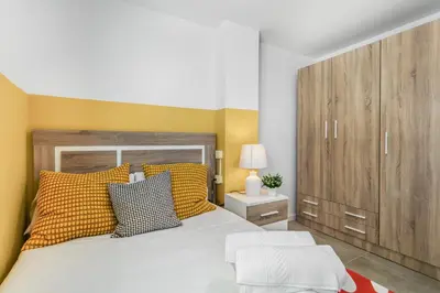 Cama o camas de una habitación en Penthouse City Hub Stay
