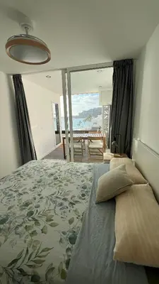 Cama o camas de una habitación en Luxury Ocean View Patalavaca Apartment