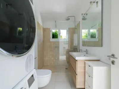 Un baño de FaroQuilla Suites Pasito Blanco